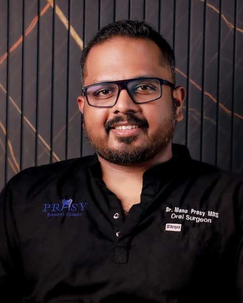 Dr. MANU E. PRASY